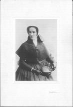 SA1708.35 - Three-quarter length portrait. Sarah Collins is dressed in a cape and bonnet; she is holding a purse. Identified on the back., Winterthur Shaker Photograph and Post Card Collection 1851 to 1921c